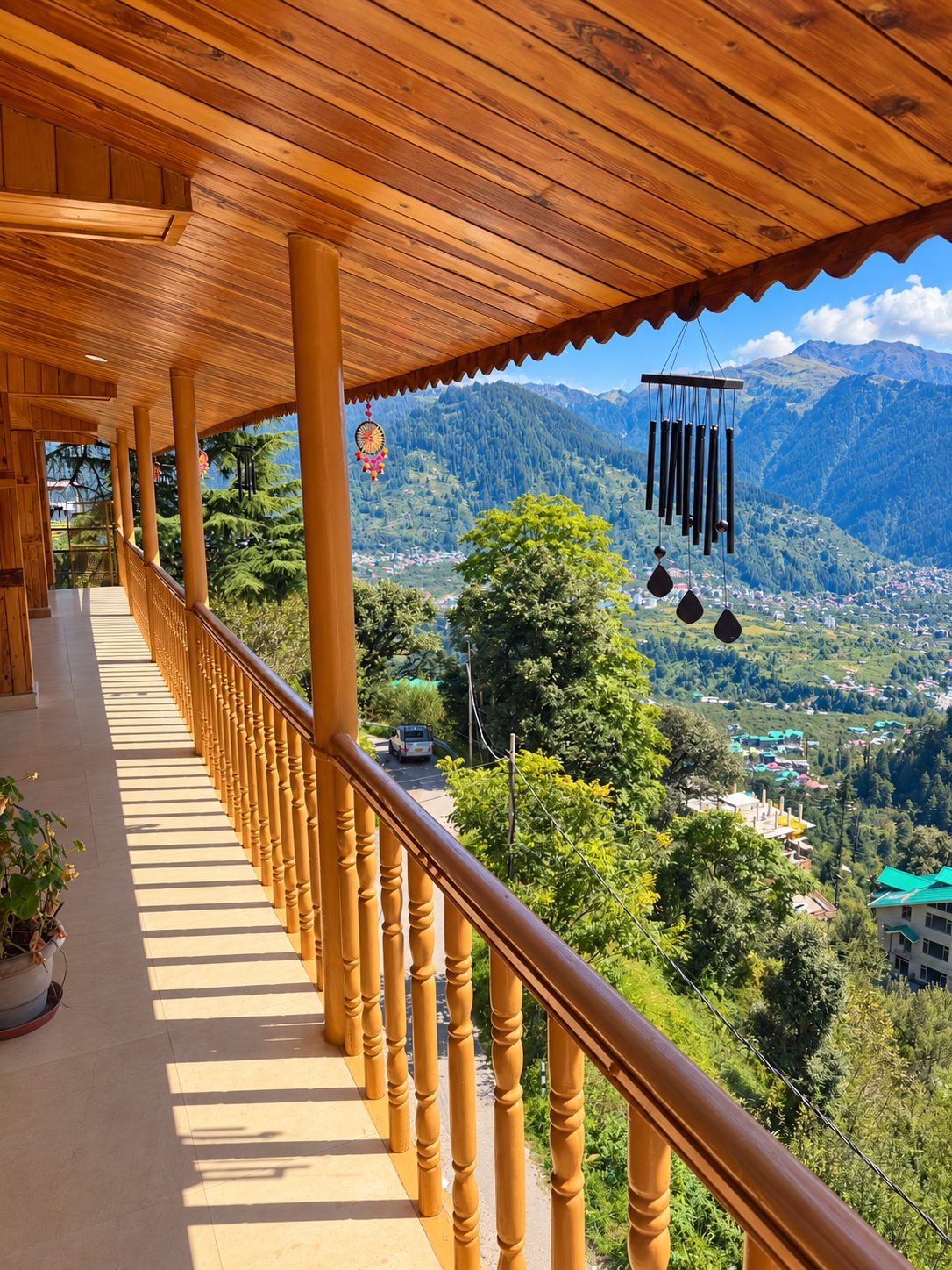 Wooden balcony walkway overlooking the Manali valley