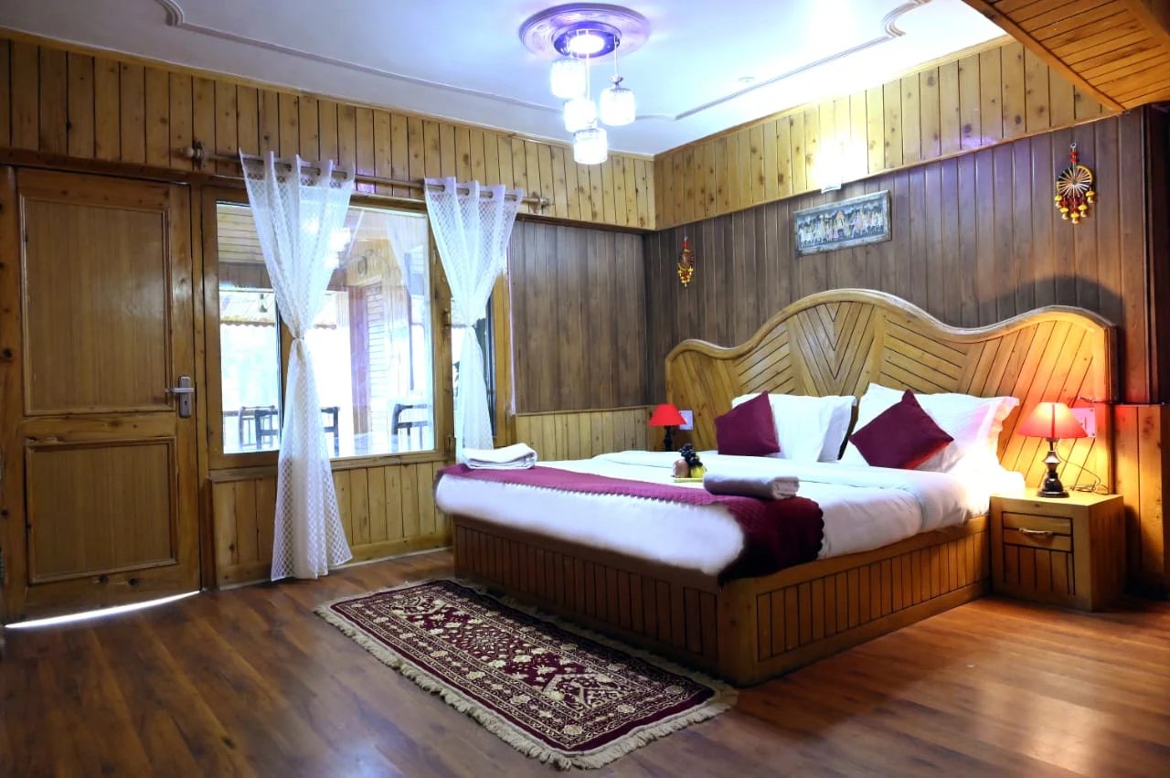 Guest room with wooden interiors